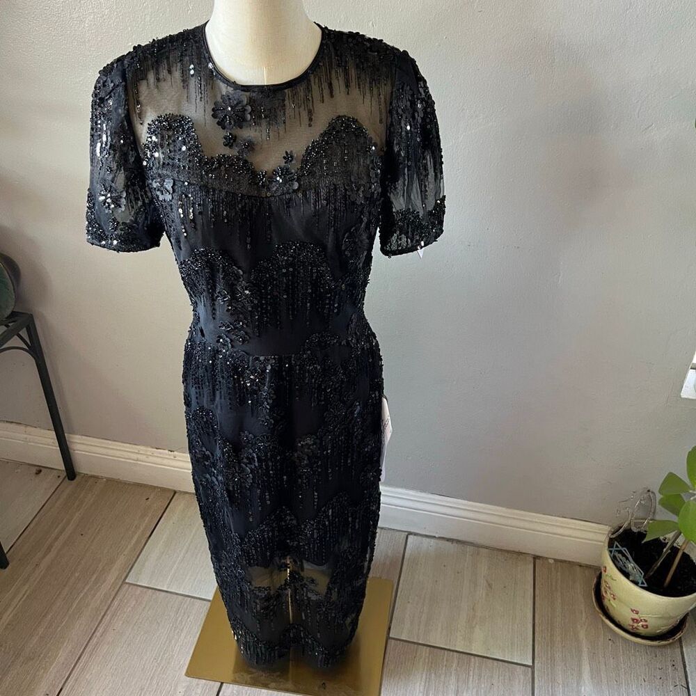 Dress the Population Lia midi cocktail dress features a sheer mesh overlay decor